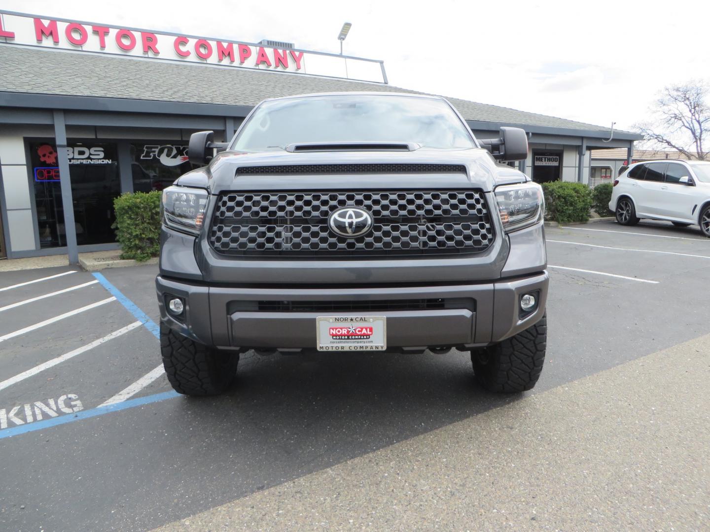 2021 CHARCOAL /GREY Toyota Tundra SR5 (5TFDY5F16MX) with an 5.7L V8 OHV 16V engine, automatic transmission, located at 2630 Grass Valley Highway, Auburn, CA, 95603, (530) 508-5100, 38.937893, -121.095482 - Features a Zone Offroad level kit, 20" SOTA wheels, 35" Nitto Ridge Grappler tires, Fox rear shocks, Air bags, front and rear TRD sway bars, and Window tint. - Photo#1